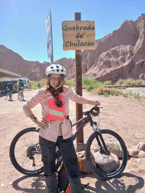 Olivia Irvine with a bicycle in Chile